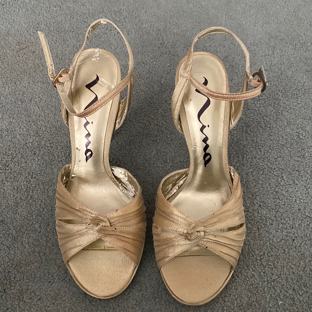 Nina Gold heels, been worn, pealing inside